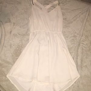 Nude dress with pewter shoulder embellishments